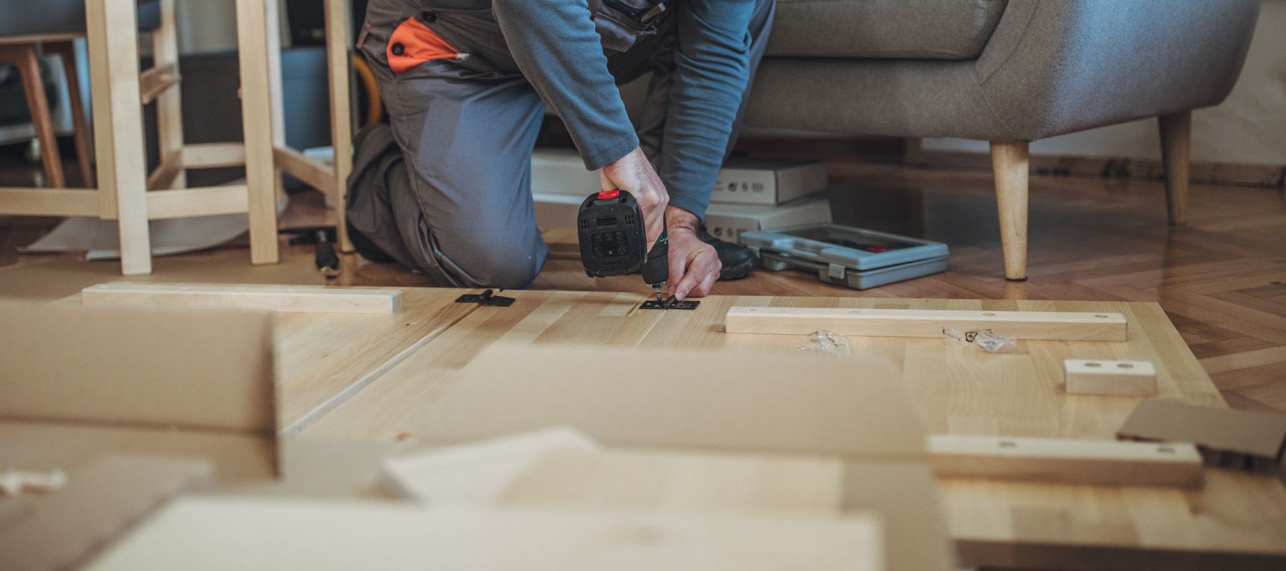 carpenter installing new cabinetry