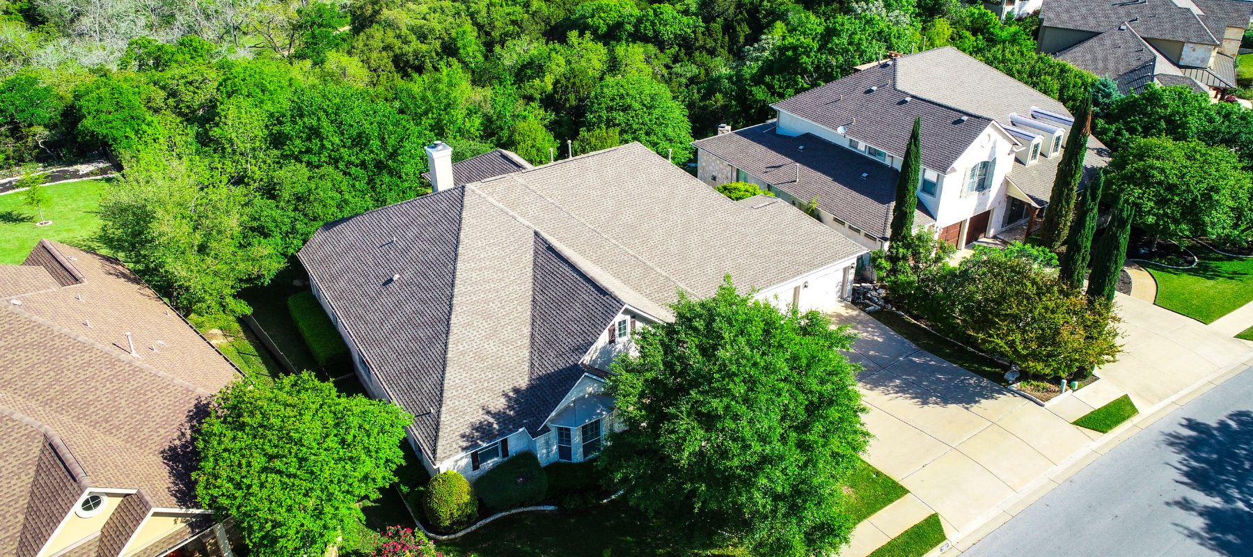 aerial shot of a two story home in stone oak, tx