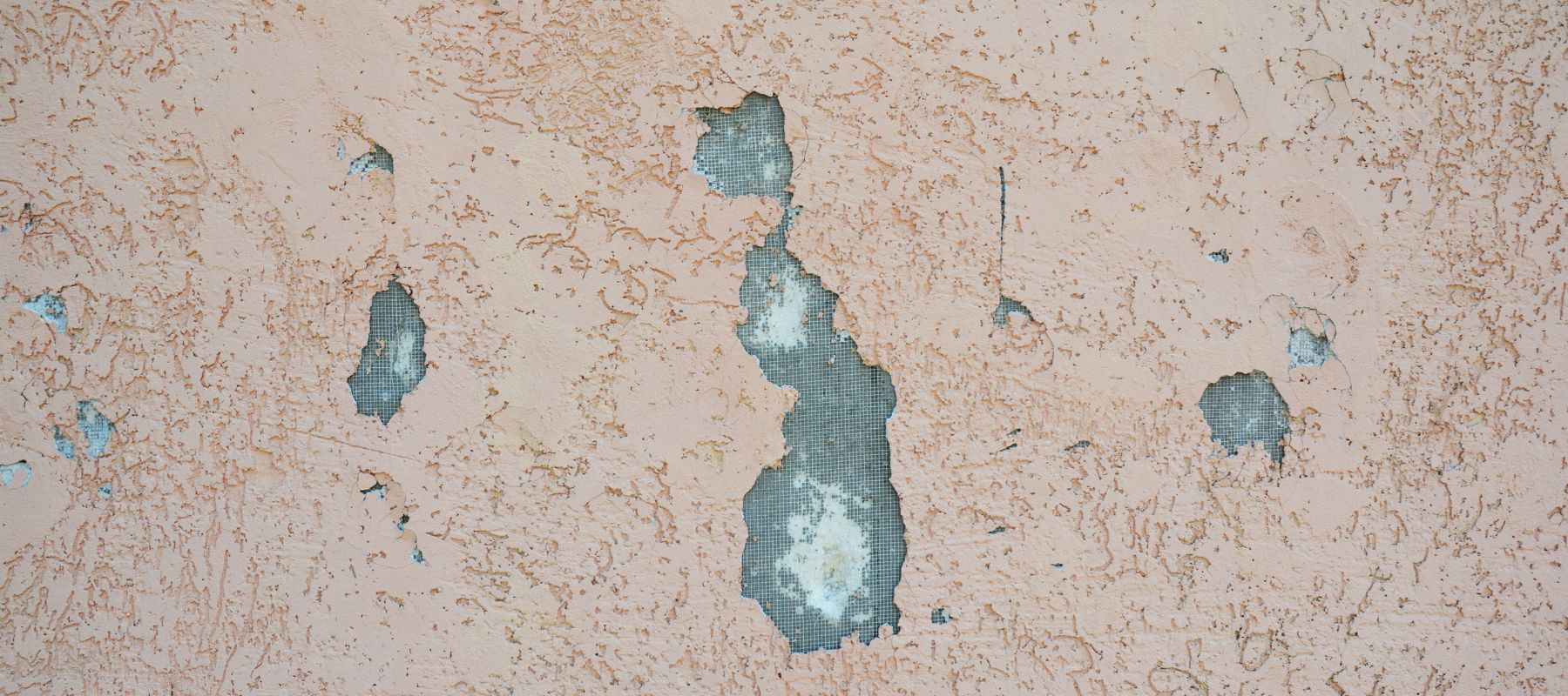 holes and cracks in stucco